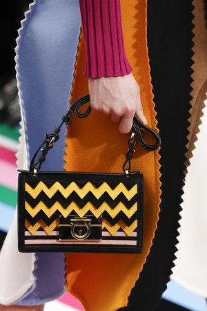 X-এ FERRAGAMO: The Classic Flap Bag dipped in the fiery hues of